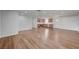 Expansive living area showcasing the seamless flow of wood floors and abundant natural light at 929 Center St, Henderson, NV 89015