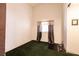 A bedroom with light walls, carpeted floors, and curtains covering the window at 945 Stetson Dr, Henderson, NV 89002