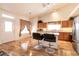 Open concept kitchen with island, stainless appliances, and lots of counter space at 945 Stetson Dr, Henderson, NV 89002
