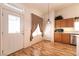 Bright kitchen with wooden cabinets and stainless steel appliances and lots of light at 945 Stetson Dr, Henderson, NV 89002