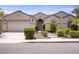 Charming single-story home featuring a well-manicured front yard and inviting curb appeal at 967 Cardelina Ln, Henderson, NV 89052