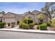 Charming single-story home boasts a well-manicured lawn and inviting curb appeal at 967 Cardelina Ln, Henderson, NV 89052