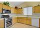 Functional kitchen with stainless steel appliances and ample counter space, ready for your culinary adventures at 967 Cardelina Ln, Henderson, NV 89052