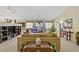 Comfortable living space with built in shelving and entertainment center for storage at 967 Cardelina Ln, Henderson, NV 89052