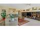 Open layout living area features built in shelving and seamless flow into the kitchen at 967 Cardelina Ln, Henderson, NV 89052