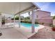 Refreshing backyard swimming pool with covered patio, ideal for enjoying outdoor living at 967 Cardelina Ln, Henderson, NV 89052