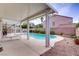 Refreshing backyard swimming pool with covered patio, ideal for enjoying outdoor living at 967 Cardelina Ln, Henderson, NV 89052