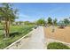 Lush community park with walking paths, picnic areas, and open green spaces for outdoor activities and relaxation at 9714 Harper Edge St, Las Vegas, NV 89143