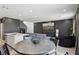 Open-concept living room boasts modern decor and lots of natural light at 9714 Harper Edge St, Las Vegas, NV 89143