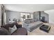 The living room features an open-concept design and comfortable seating at 9714 Harper Edge St, Las Vegas, NV 89143