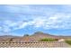Stunning mountain views with beautiful skyline over the rooftops of community homes at 10085 S Riley St, Las Vegas, NV 89178
