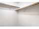 This walk-in closet has ample storage with shelving on the walls at 10085 S Riley St, Las Vegas, NV 89178