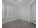 Cozy bedroom with ample natural light and custom shelving at 10113 Plomosa Pl, Las Vegas, NV 89134