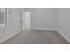 Large bedroom with carpet flooring and a window at 10113 Plomosa Pl, Las Vegas, NV 89134