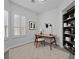 Bedroom staged as home office with a desk and built in shelves at 10113 Plomosa Pl, Las Vegas, NV 89134