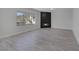 Bright living room featuring a modern fireplace and large window at 10113 Plomosa Pl, Las Vegas, NV 89134