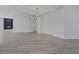 Large open living area features wood-look floors, recessed lighting, and a modern fireplace at 10113 Plomosa Pl, Las Vegas, NV 89134