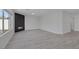 Spacious living room with modern fireplace and ample natural light at 10113 Plomosa Pl, Las Vegas, NV 89134