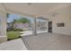 Covered patio overlooking fenced in artificial grass and pool at 10113 Plomosa Pl, Las Vegas, NV 89134