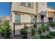 Well maintained home with tidy landscaping and a black metal front yard fence at 1131 Ruby Sparrow St, Henderson, NV 89011