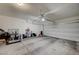 Spacious two-car garage with concrete flooring and overhead lighting at 1131 Ruby Sparrow St, Henderson, NV 89011