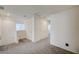 Spacious hallway with neutral carpet and white walls at 1131 Ruby Sparrow St, Henderson, NV 89011