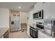 Modern kitchen featuring stainless steel appliances and white cabinets at 1131 Ruby Sparrow St, Henderson, NV 89011