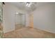 Bedroom featuring mirrored closet doors and neutral walls at 11441 Drappo Ave, Las Vegas, NV 89138