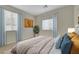 Bedroom with carpet, houseplant, and natural lighting at 11441 Drappo Ave, Las Vegas, NV 89138