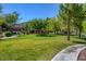 Picturesque community park boasting well-maintained lawns, mature trees, and convenient walking paths for an active lifestyle at 11441 Drappo Ave, Las Vegas, NV 89138