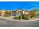 Lovely home on a corner lot featuring mature landscaping and a well-maintained lawn at 11441 Drappo Ave, Las Vegas, NV 89138