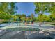 Community playground featuring swings, slides, and colorful play equipment at 11441 Drappo Ave, Las Vegas, NV 89138