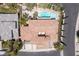Aerial view showing an estate with a pool, unique roof design, and expansive yard at 11550 Lampeter Ct, Las Vegas, NV 89138