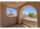 Private balcony with stunning architectural details and views of the surrounding neighborhood at 11550 Lampeter Ct, Las Vegas, NV 89138