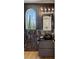 Elegant powder room features designer tile, modern fixtures, and stylish vanity at 11550 Lampeter Ct, Las Vegas, NV 89138