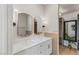Bright bathroom with double vanity, modern mirrors, and stylish fixtures at 11550 Lampeter Ct, Las Vegas, NV 89138