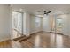 Open bonus room with hardwood floors, recessed lighting, and easy access to an outdoor balcony at 11550 Lampeter Ct, Las Vegas, NV 89138