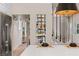 Elegant dining area showcasing modern wine rack and stylish decor at 11550 Lampeter Ct, Las Vegas, NV 89138