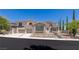 Beautiful two-story home with a well-manicured yard and three-car garage at 11550 Lampeter Ct, Las Vegas, NV 89138