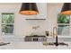 Gourmet kitchen with stainless steel appliances, stylish fixtures, and bright natural light at 11550 Lampeter Ct, Las Vegas, NV 89138