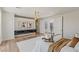 Bright main bedroom with hardwood floors, stylish lighting, and access to a private balcony at 11550 Lampeter Ct, Las Vegas, NV 89138