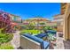 Inviting backyard featuring a patio with comfortable seating, a lush lawn, and a serene outdoor ambiance at 12286 Silvana St, Las Vegas, NV 89141