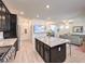 Bright kitchen with stainless appliances, an island, granite counters and an open floor plan at 12286 Silvana St, Las Vegas, NV 89141