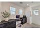 A bright office space featuring a built-in desk, drawers and natural lighting at 12286 Silvana St, Las Vegas, NV 89141