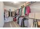 A well-organized walk-in closet with clothing racks and shelves for ample storage at 12286 Silvana St, Las Vegas, NV 89141