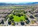Aerial view of community park surrounded by residential homes at 1560 Plaza Centre Dr # 103, Las Vegas, NV 89135