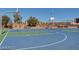 Community basketball court with painted lines and hoops at 1560 Plaza Centre Dr # 103, Las Vegas, NV 89135