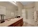 Neutral bathroom featuring granite countertops and a bathtub at 1560 Plaza Centre Dr # 103, Las Vegas, NV 89135