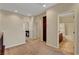 Upstairs landing with neutral carpeting, with bathroom entrance at 1560 Plaza Centre Dr # 103, Las Vegas, NV 89135