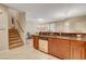 Kitchen features stainless steel dishwasher and sink with tile floor at 1560 Plaza Centre Dr # 103, Las Vegas, NV 89135
